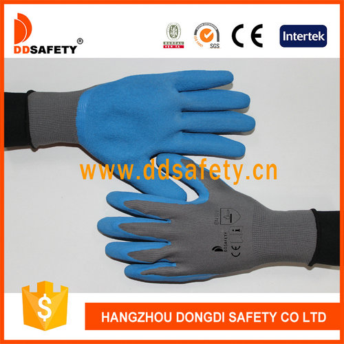 Grey nylon with blue latex glove Grey nylon with blue latex glove